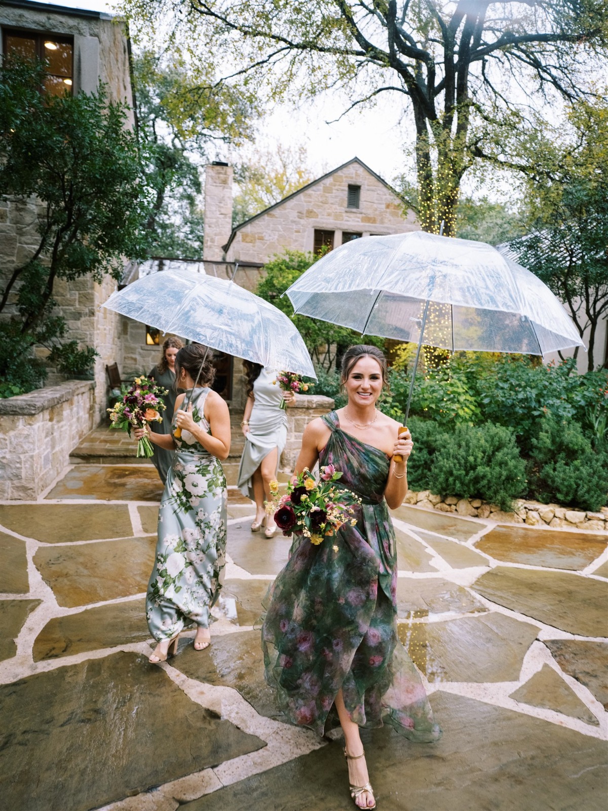 bridesmaids with umbrellas