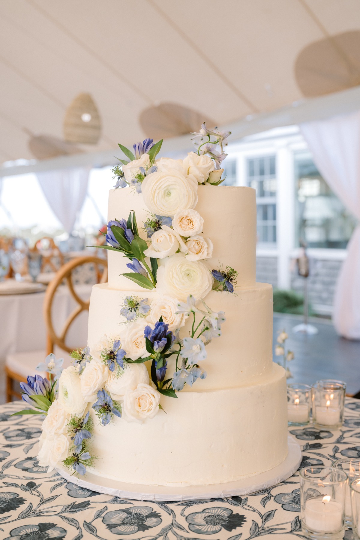 asymmetrical blue and white floral cake