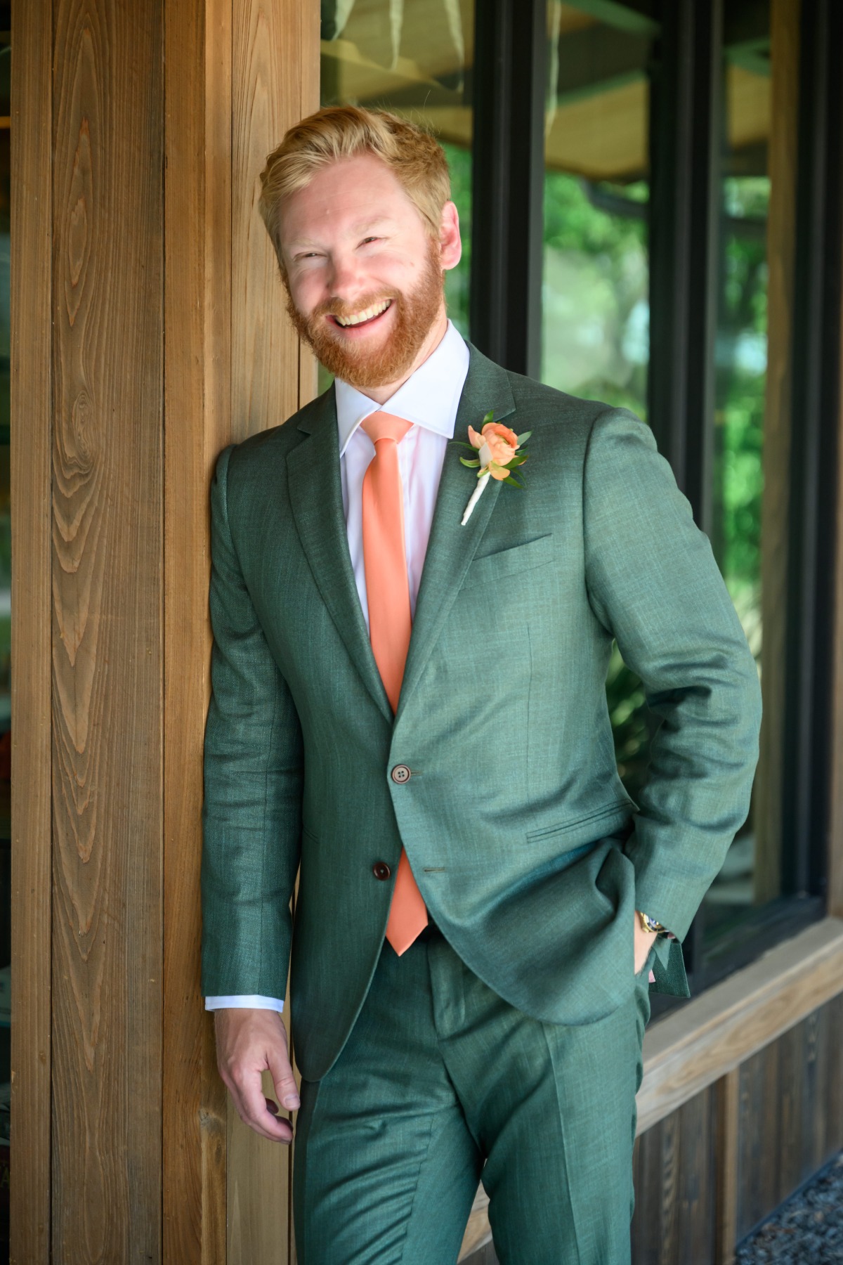 groom in green suit