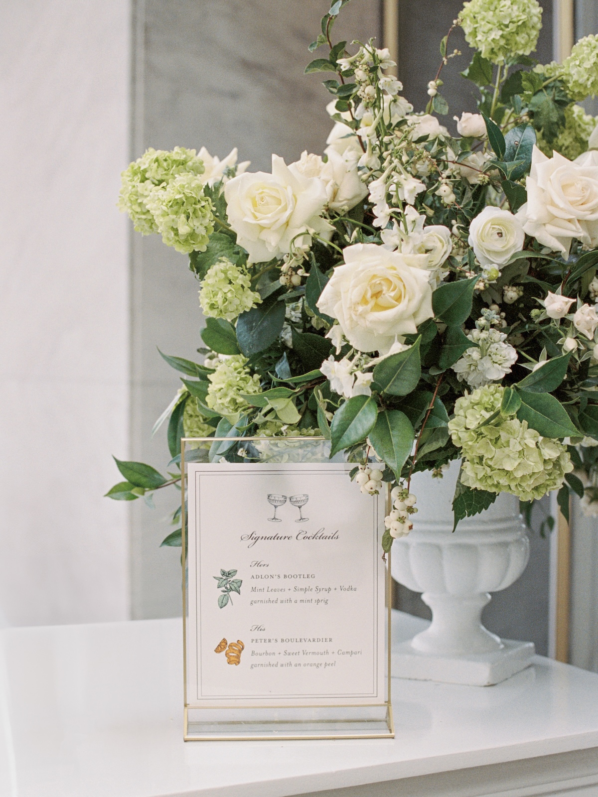 white roses and light green centerpieces