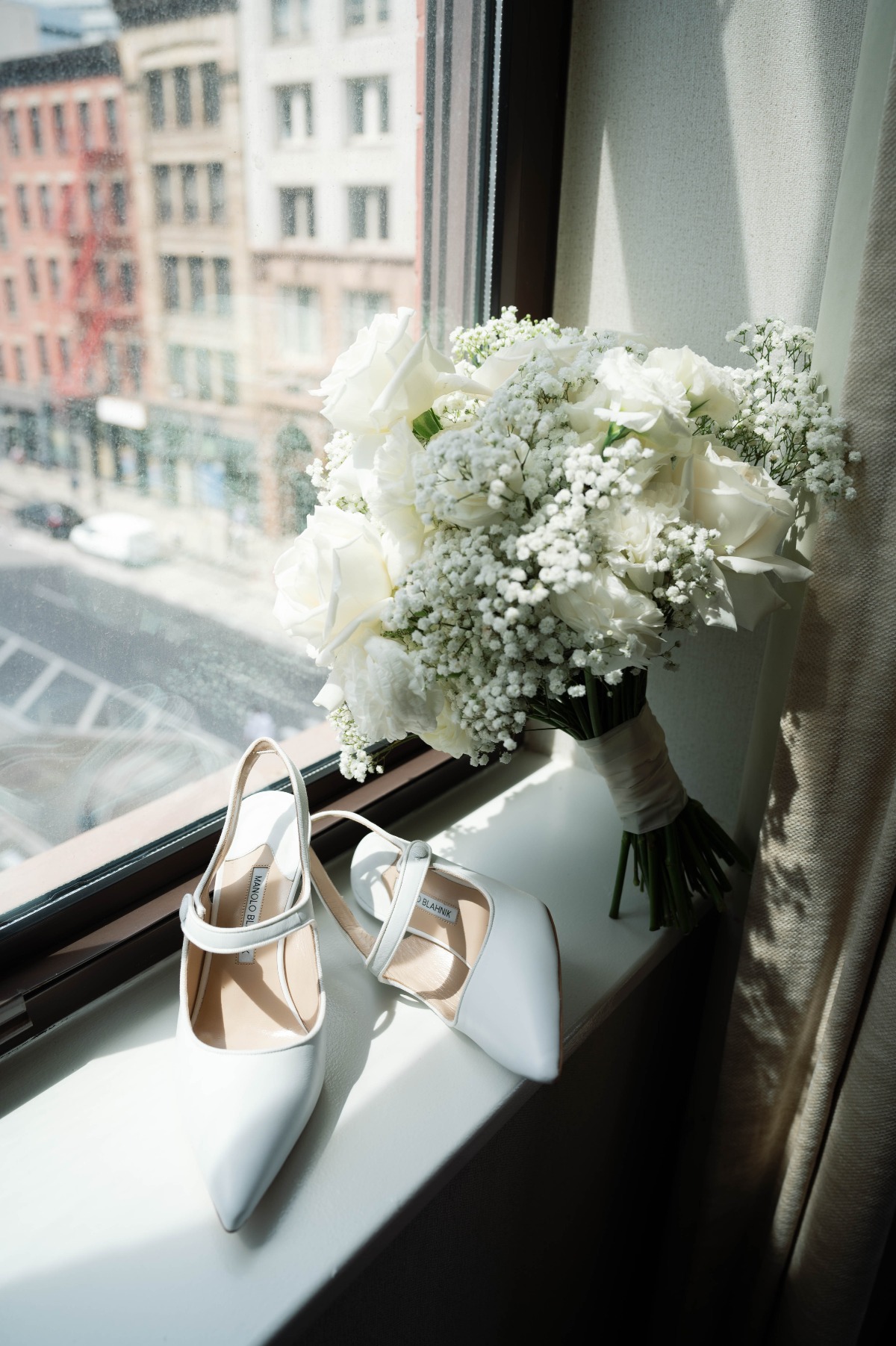 baby's breath and white rose bouquet