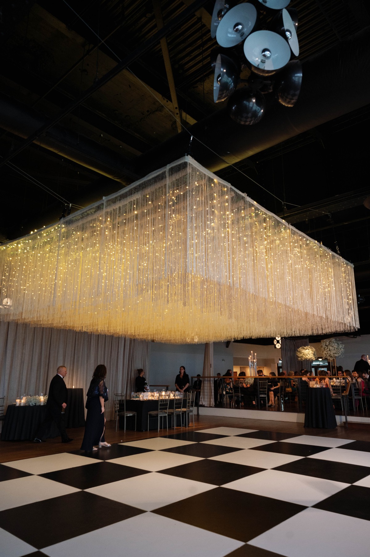 gold fringe hanging installation
