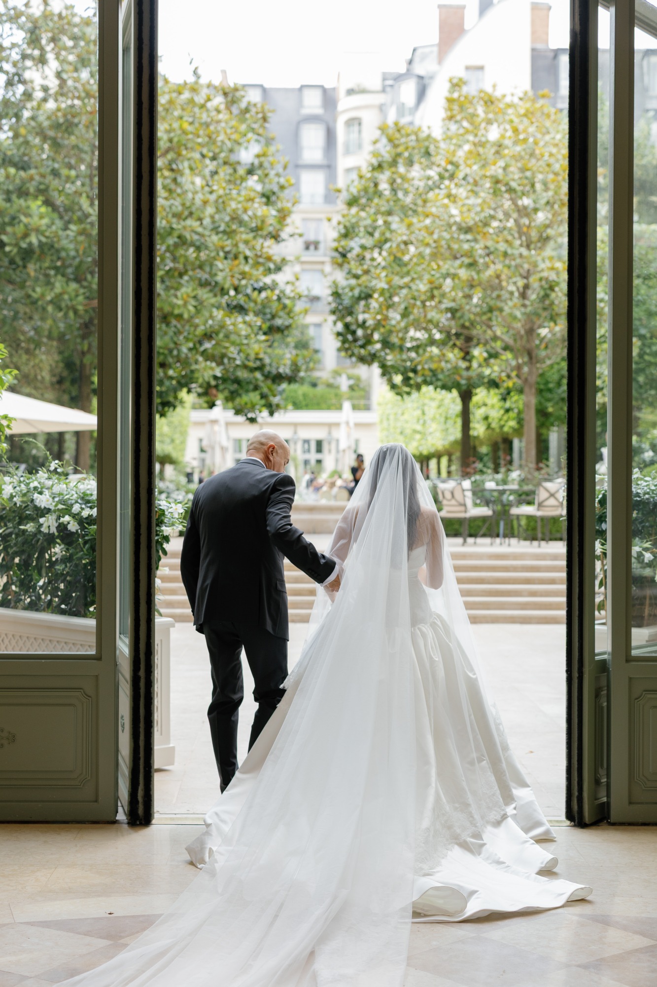 father walking bride down the aisle in paris