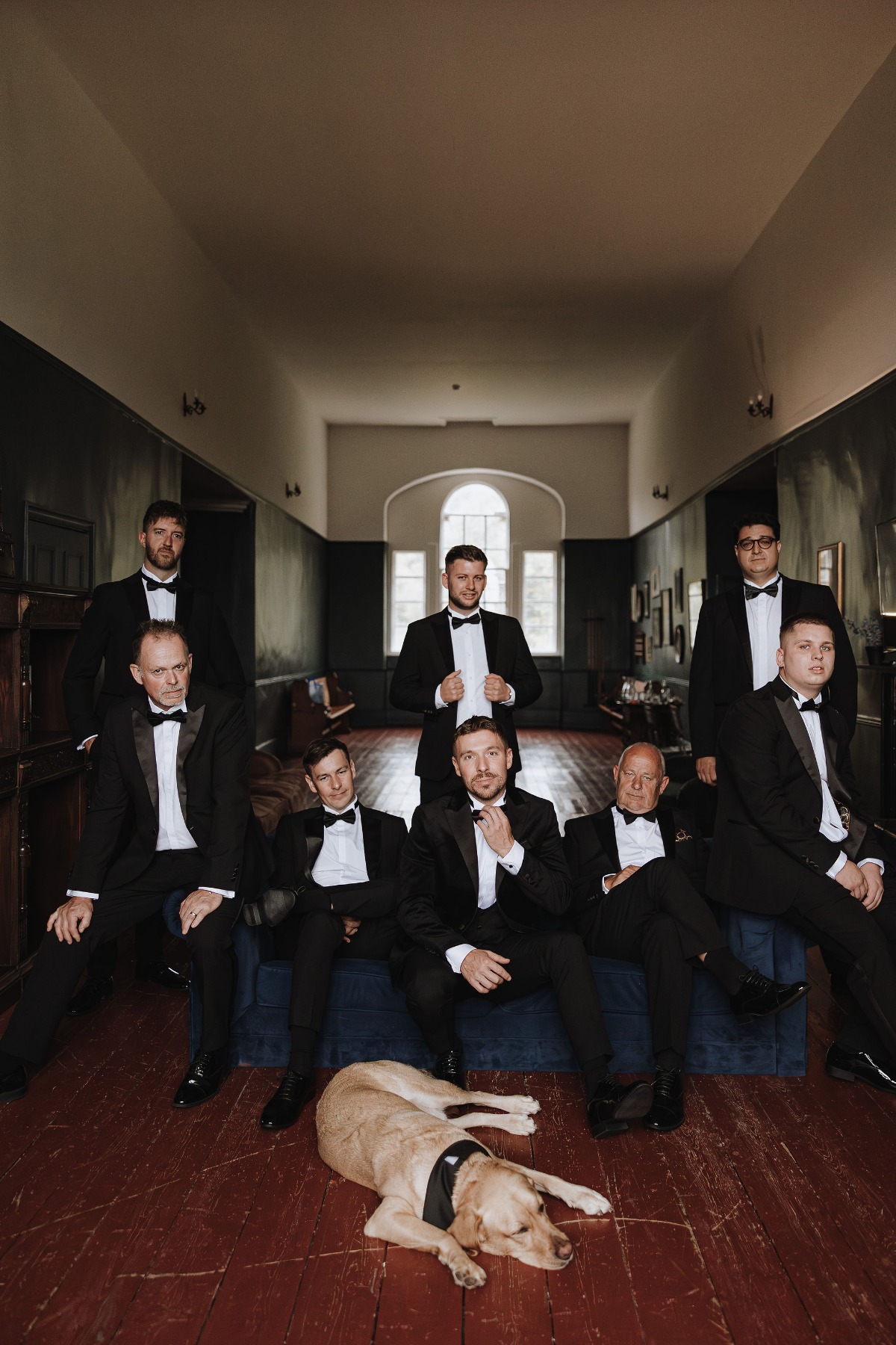 groom and groomsmen in black tuxedos