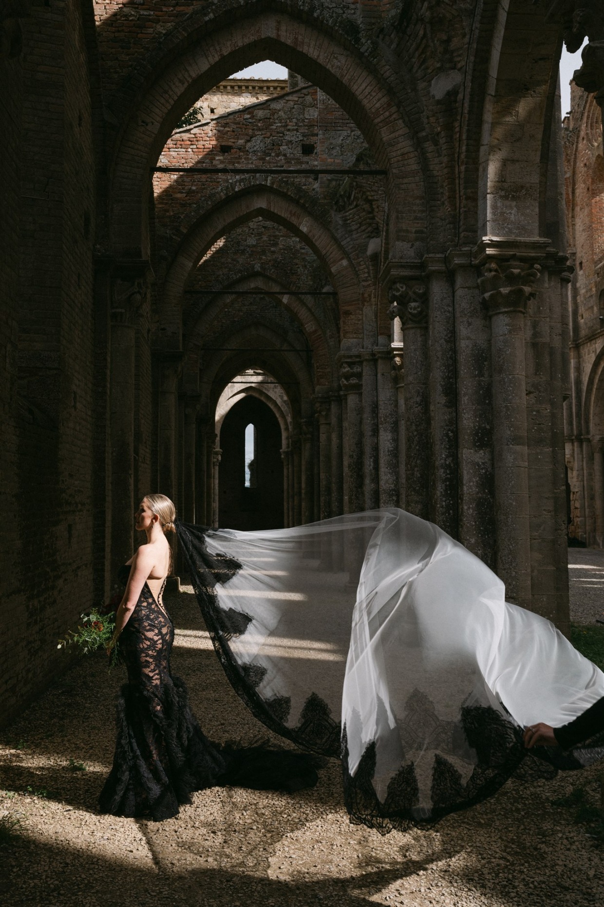 bride in fuego gown by galia lahav and matching veil