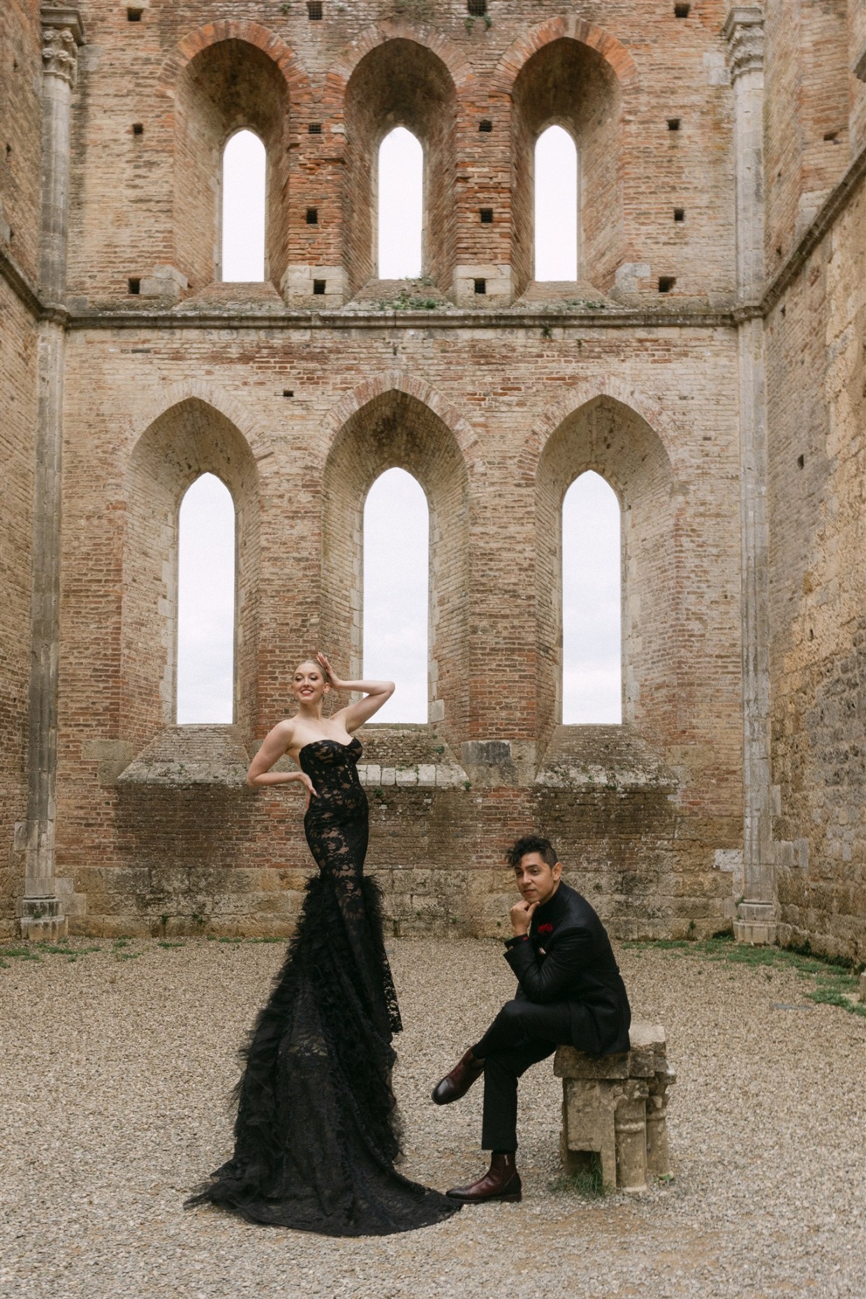 bride poses in fuego gown by galia lahav