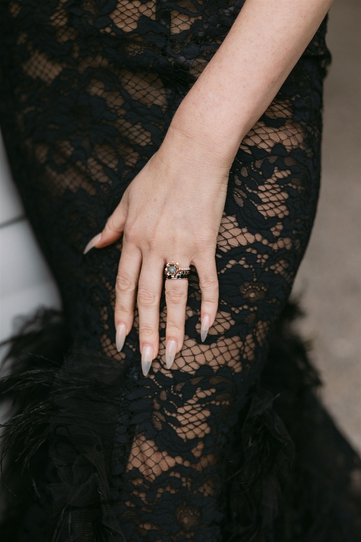 bride in black fuego gown by galia lahav with long almond nails