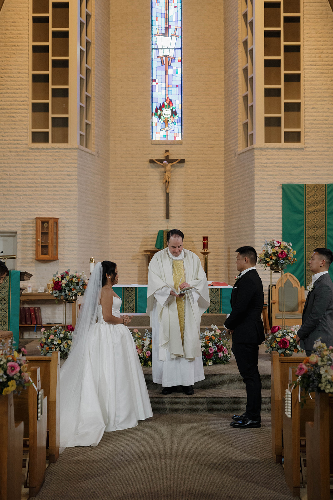 jewel tone ceremony floral arrangements