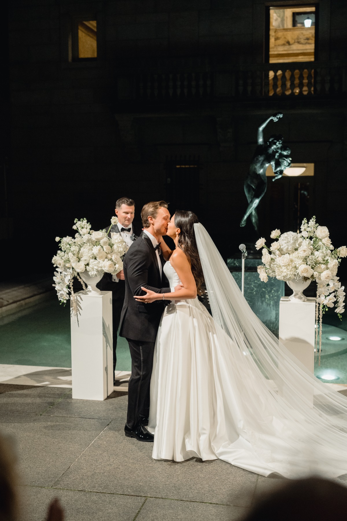 white rose and baby's breath ceremony florals