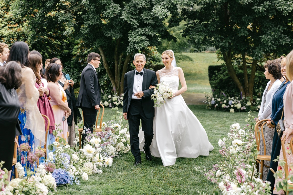 father walking bride down the aisle