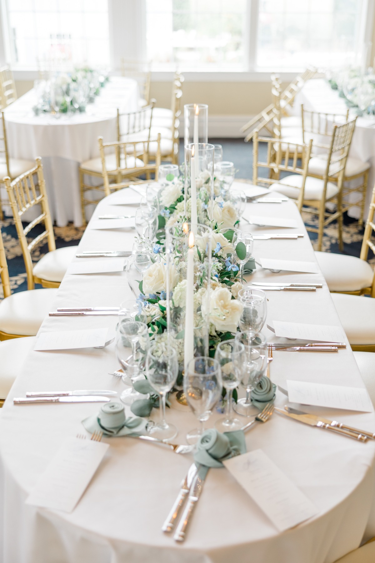 sage blue and ivory wedding centerpiece