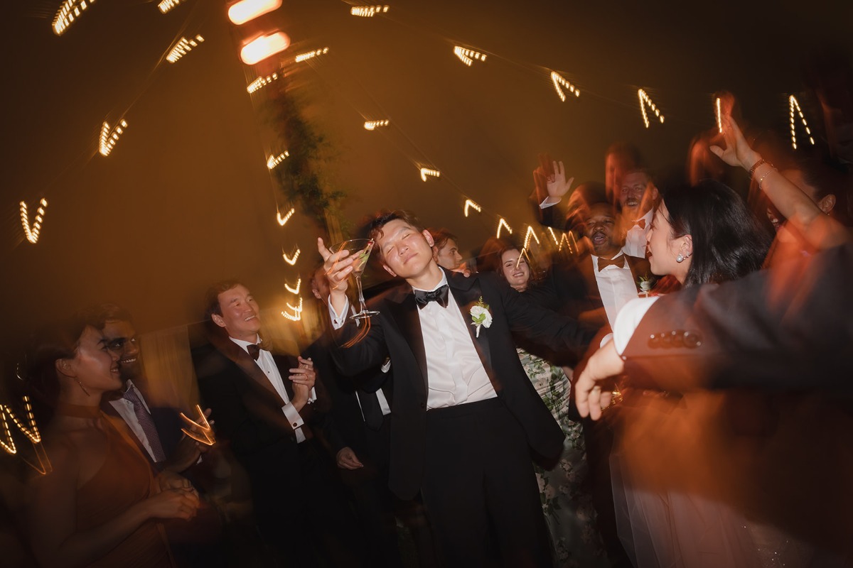groom dancing with martini