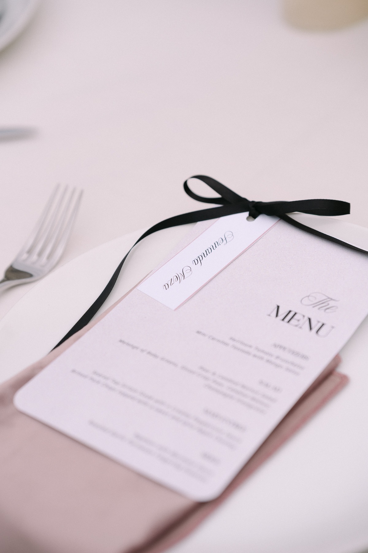 black ribbon bow on menu