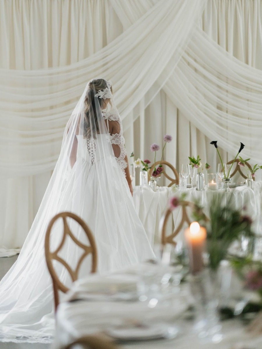 bride with drapery around