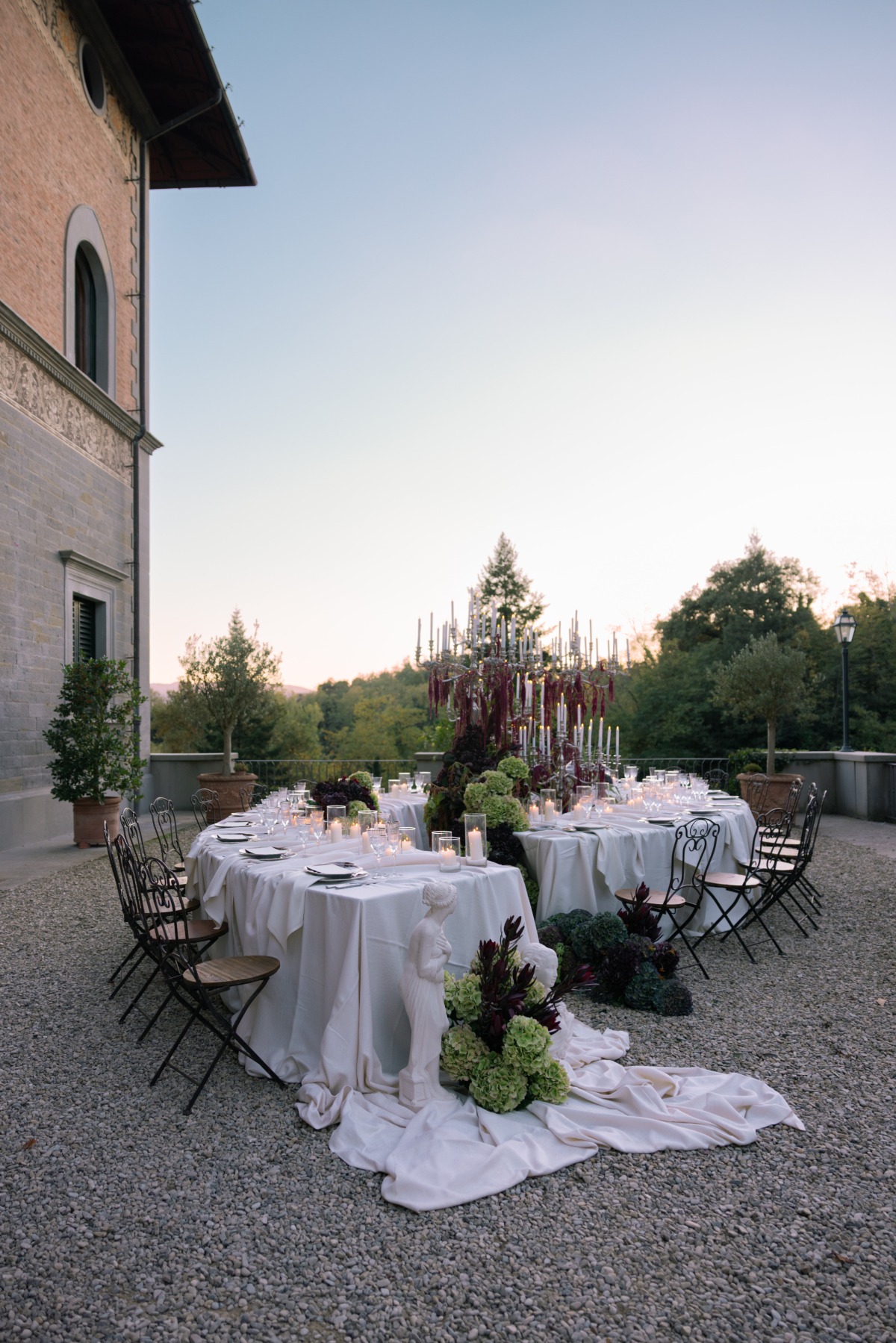 unique reception table outside on patio