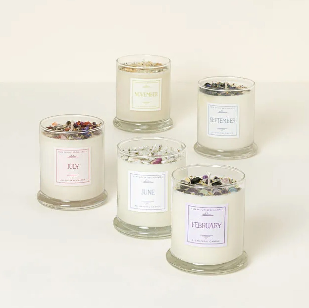 unique gift ideas with candles poured with birth month gems and flowers