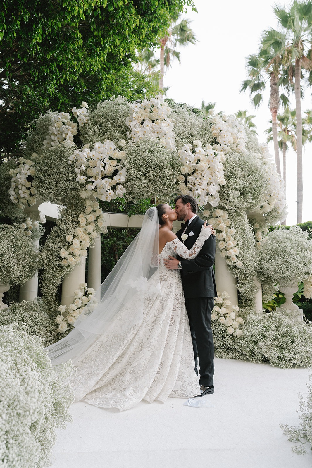 babys breath and white rose chuppah