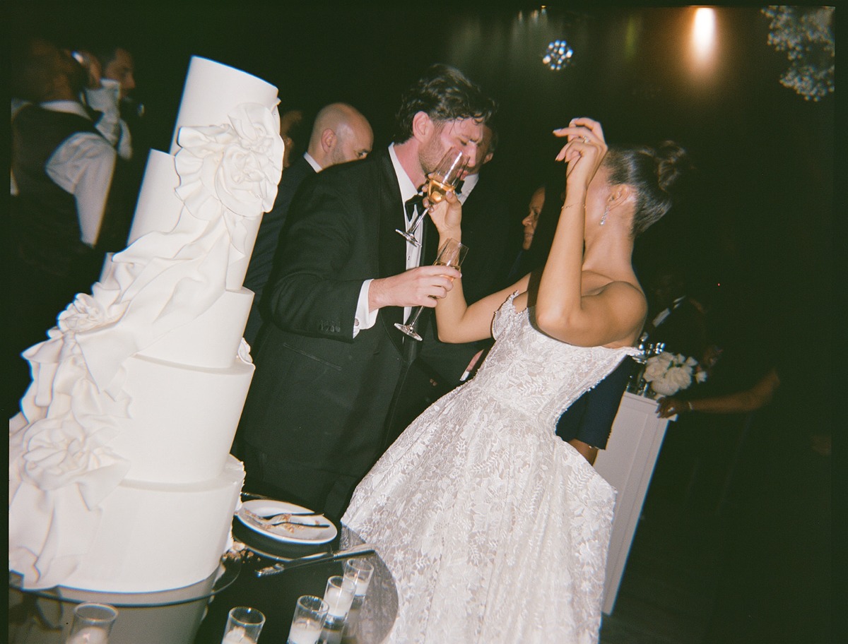 couple cutting wedding cake