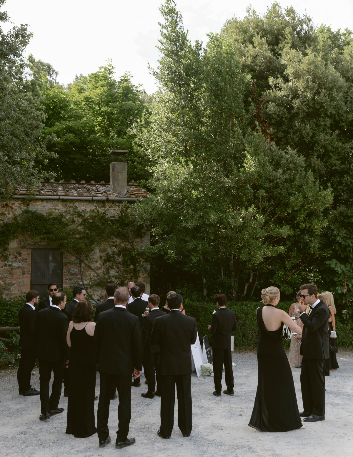 wedding guests all wearing black