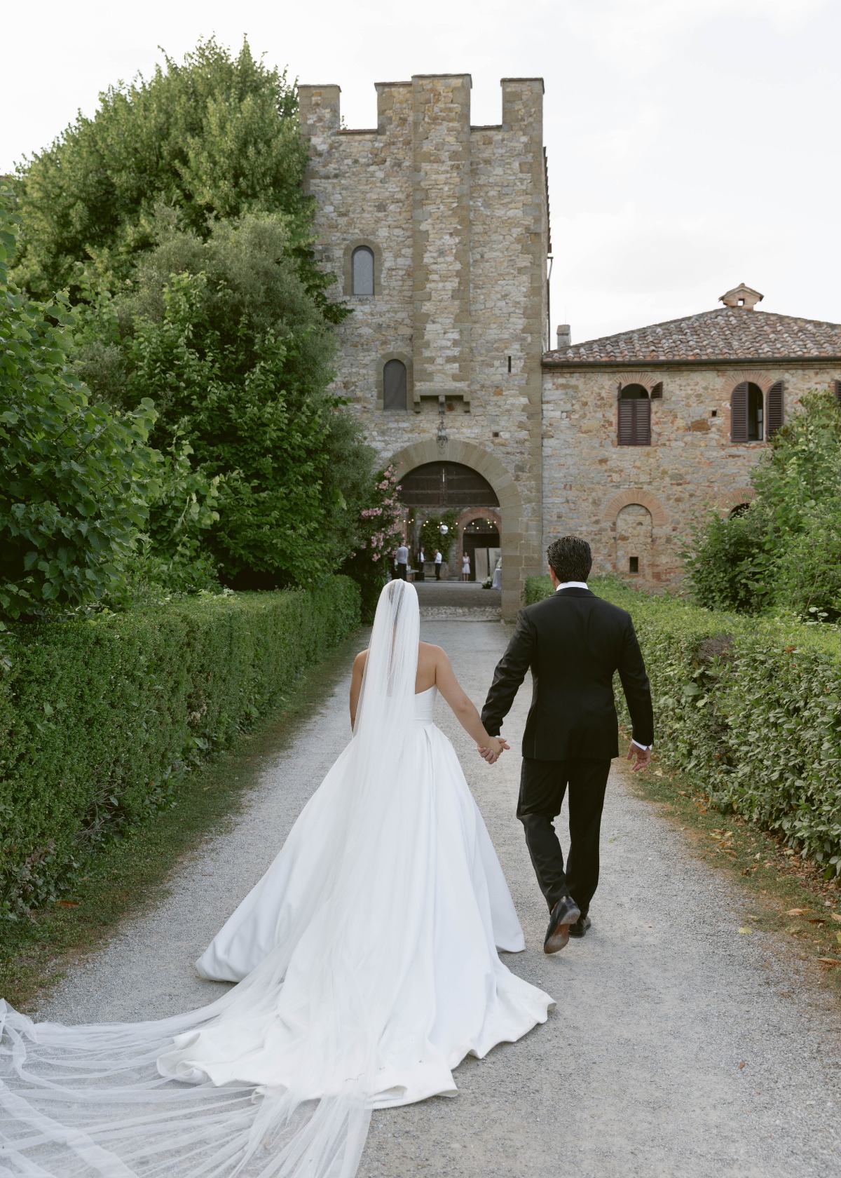 bride and groom walking to reception