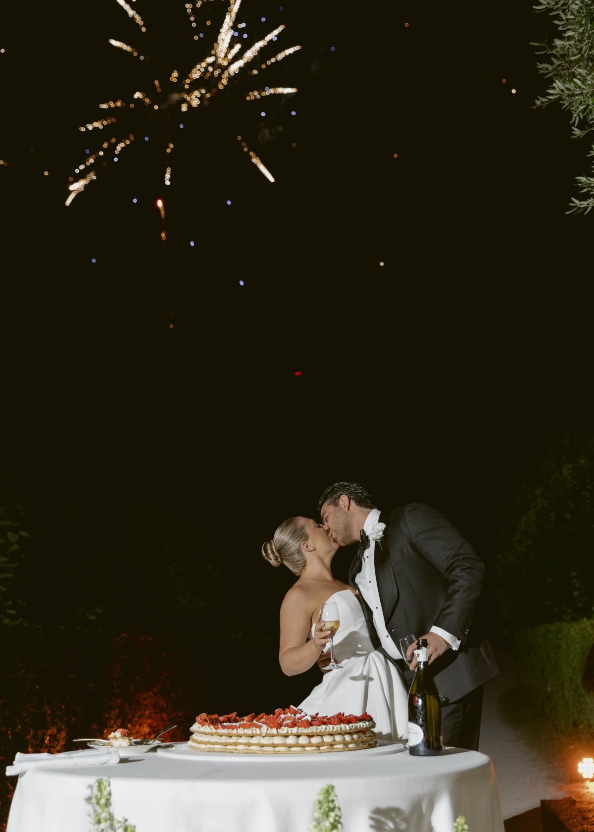 bride and groom cutting italian wedding cake