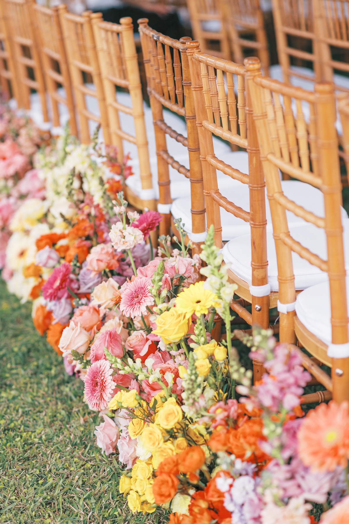 vibrant wedding ceremony flowers