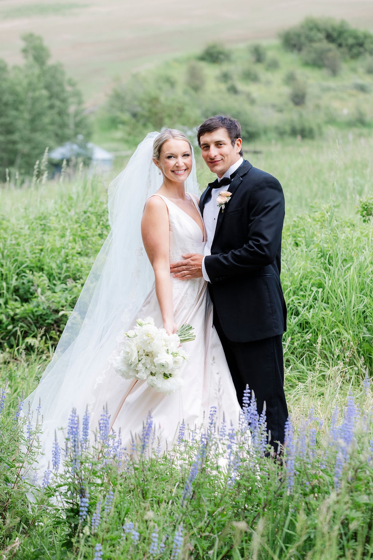 couples portrait ideas in wildflower field