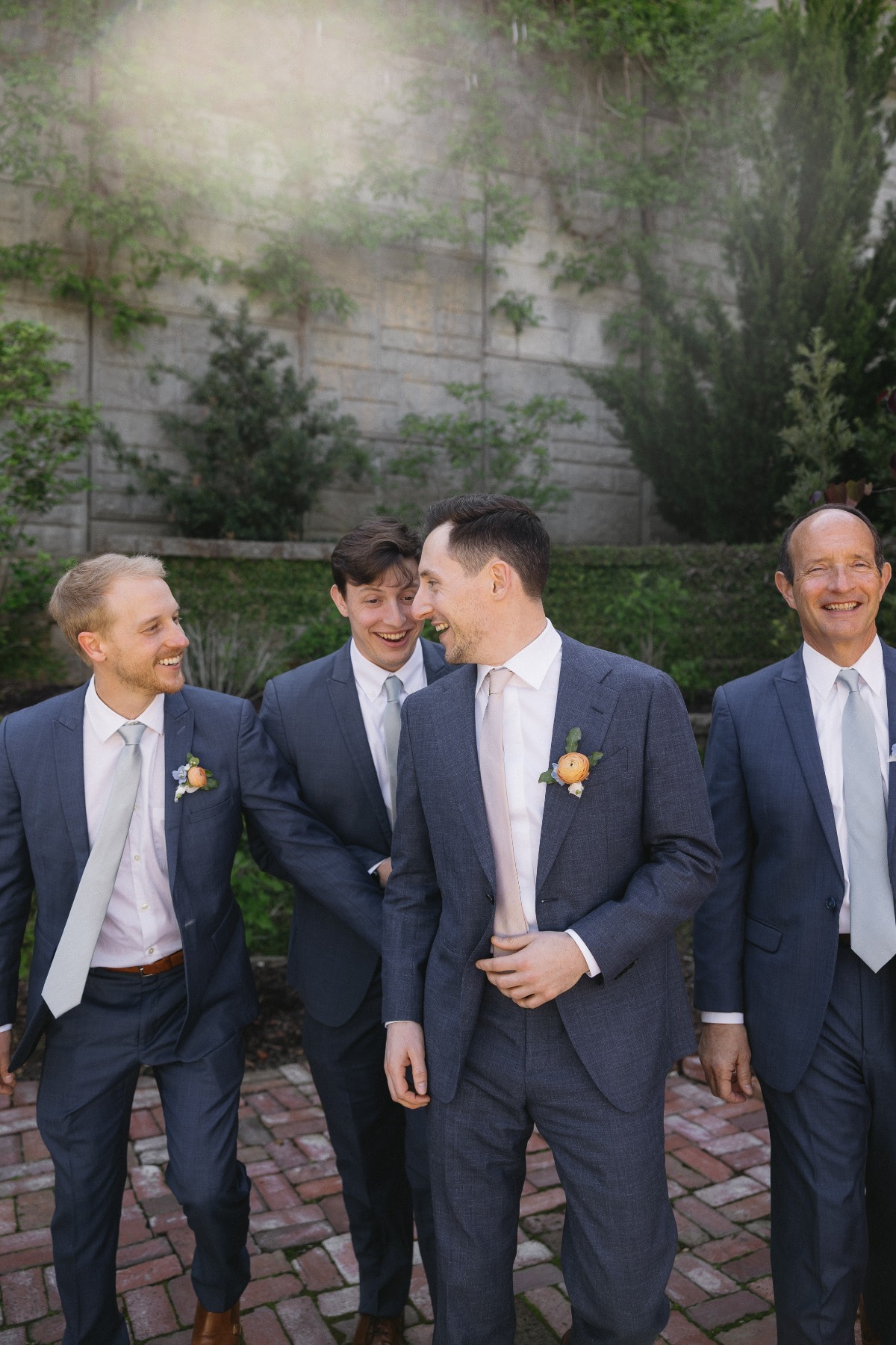 groomsmen in blue suits