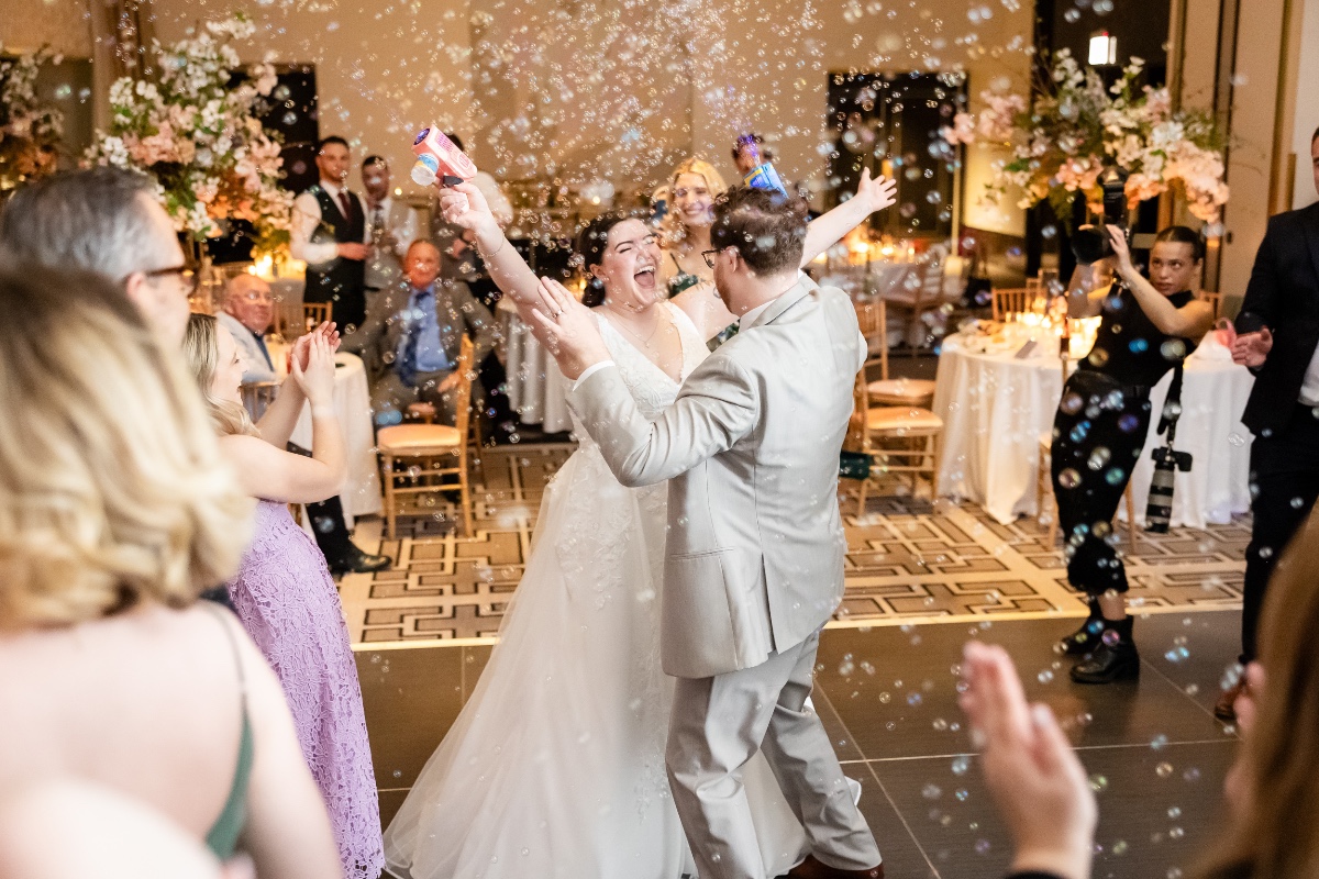 bubble guns on dancefloor at wedding