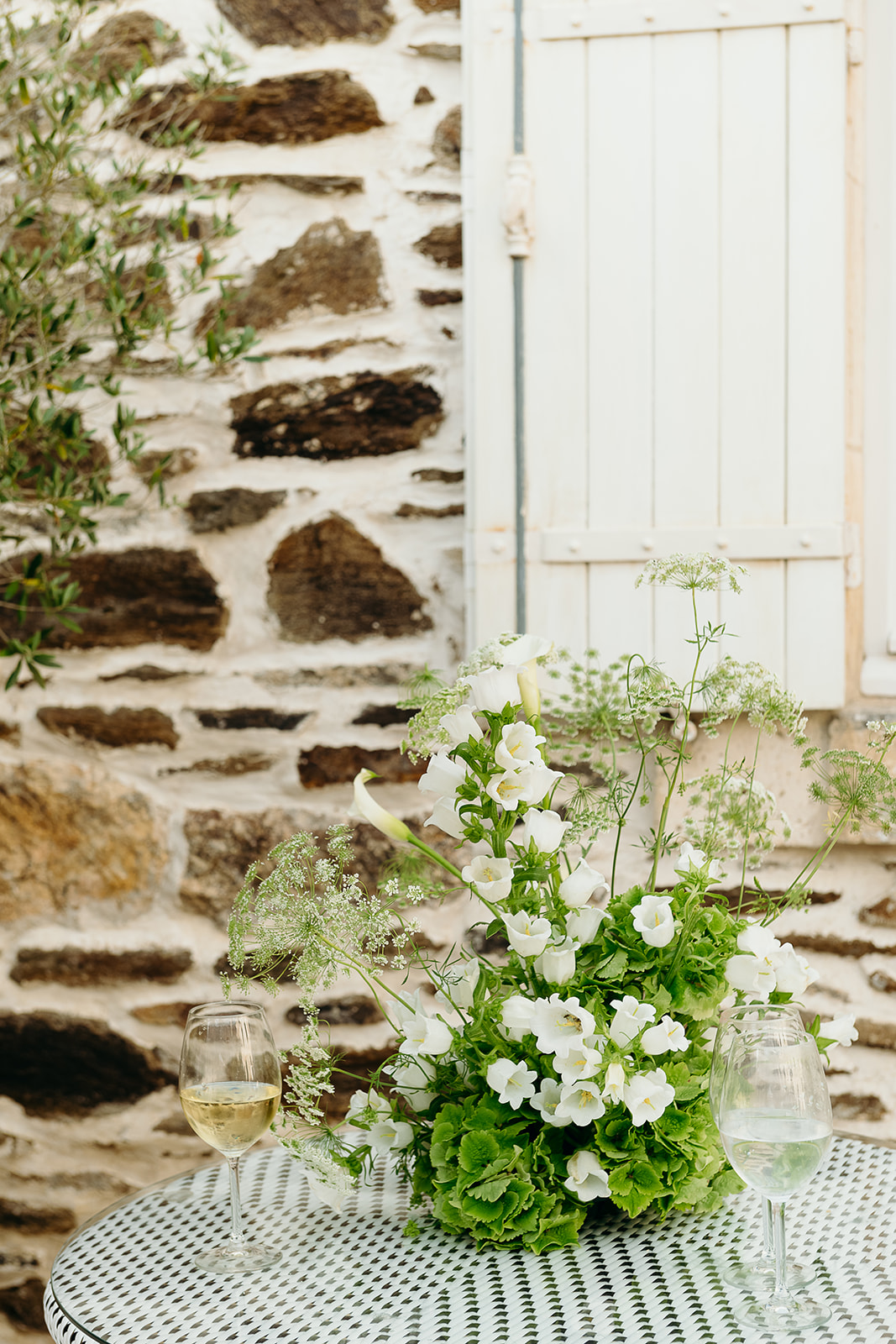 green and white wildflower arrangements
