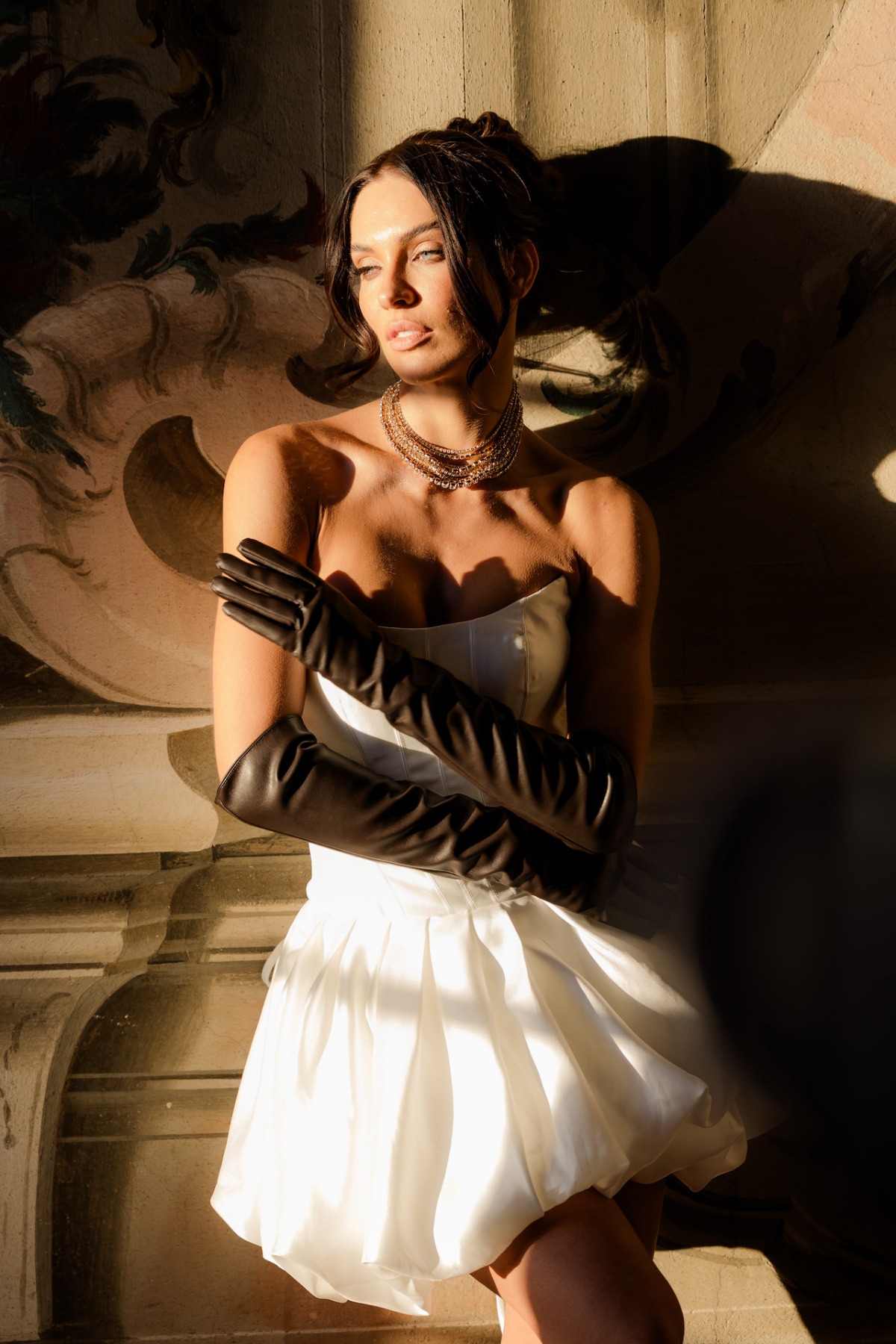 bridal mini with black leather gloves