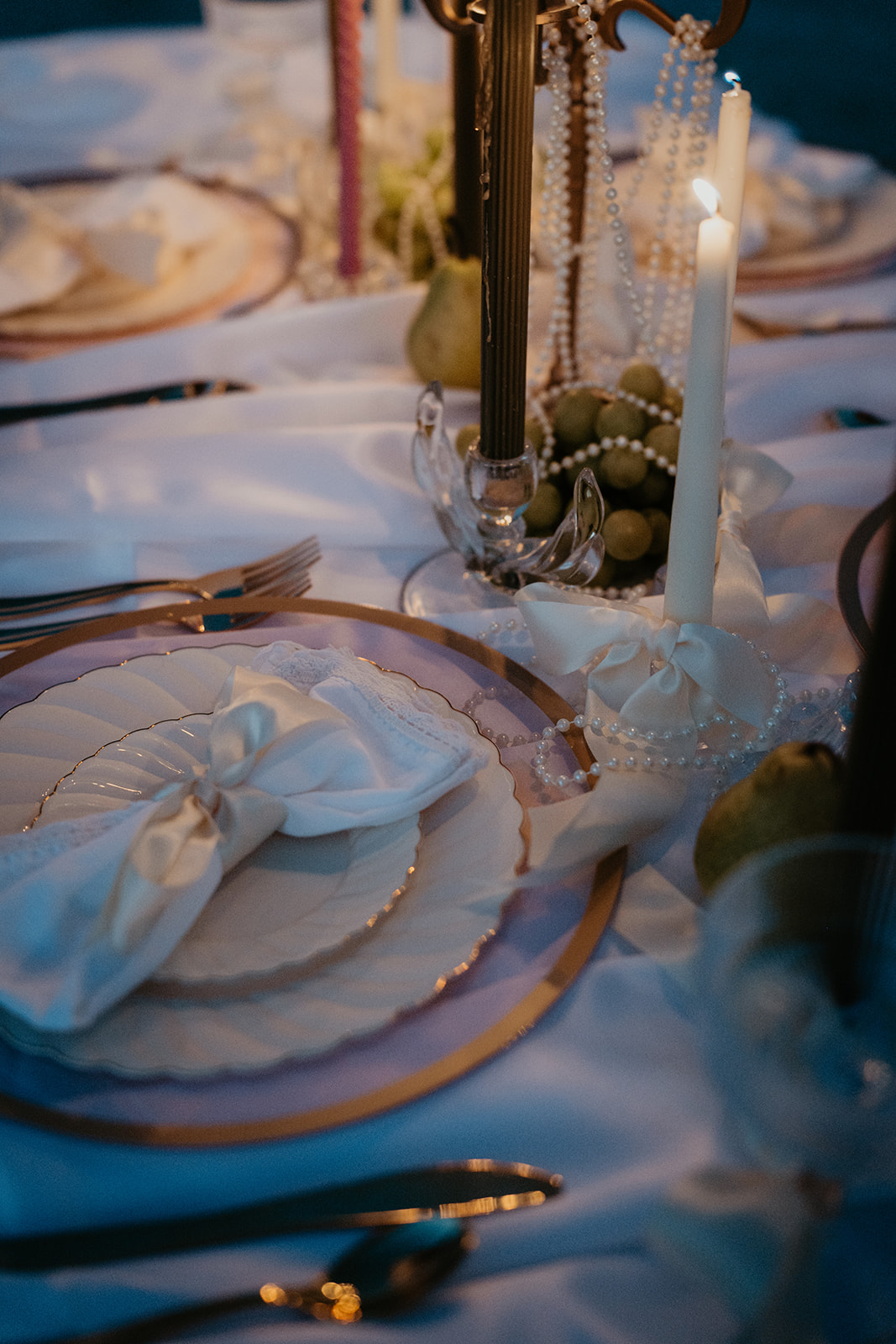 pink white and gold place settings