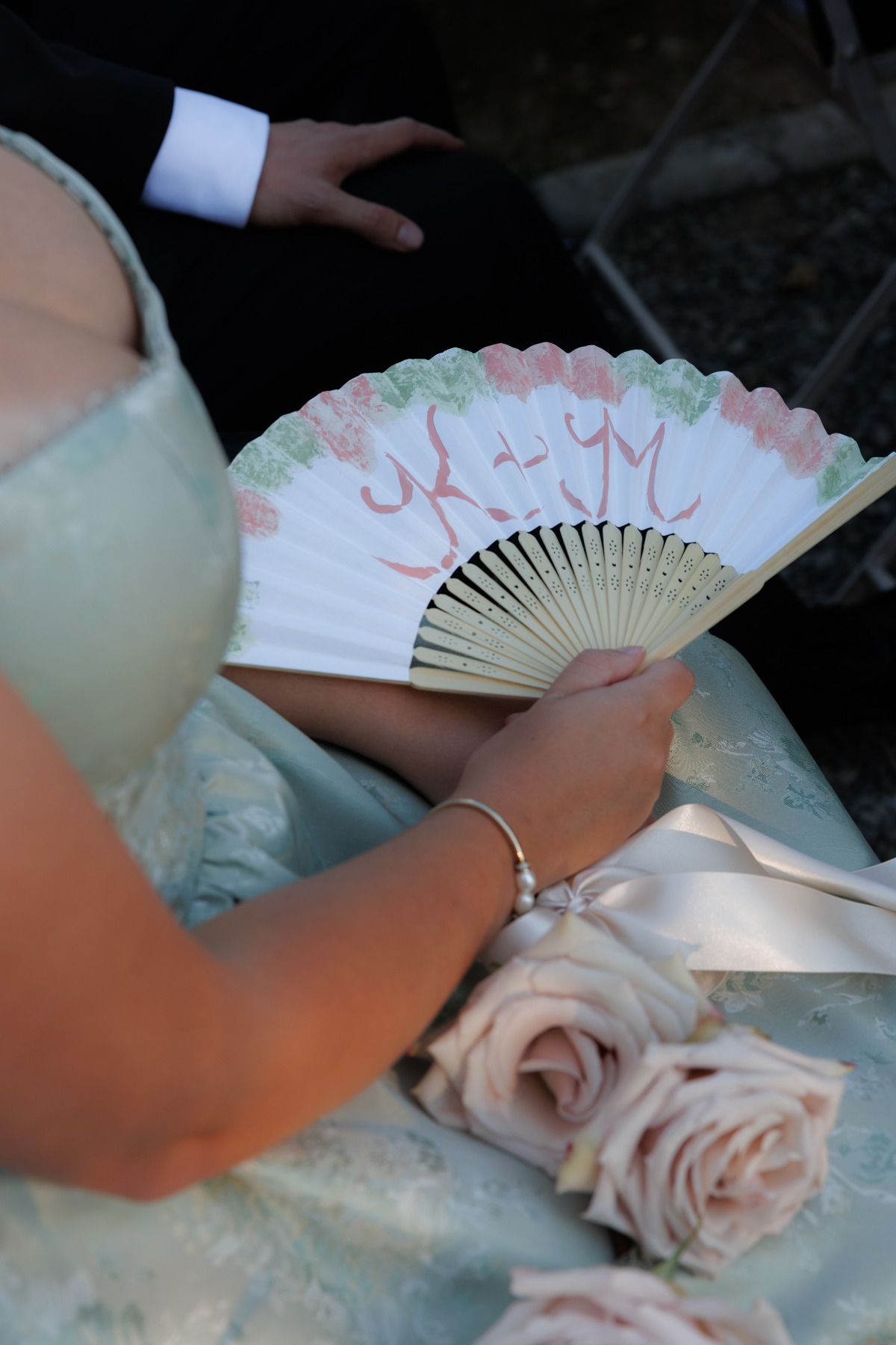 wedding guest holding hand painted ceremony fn