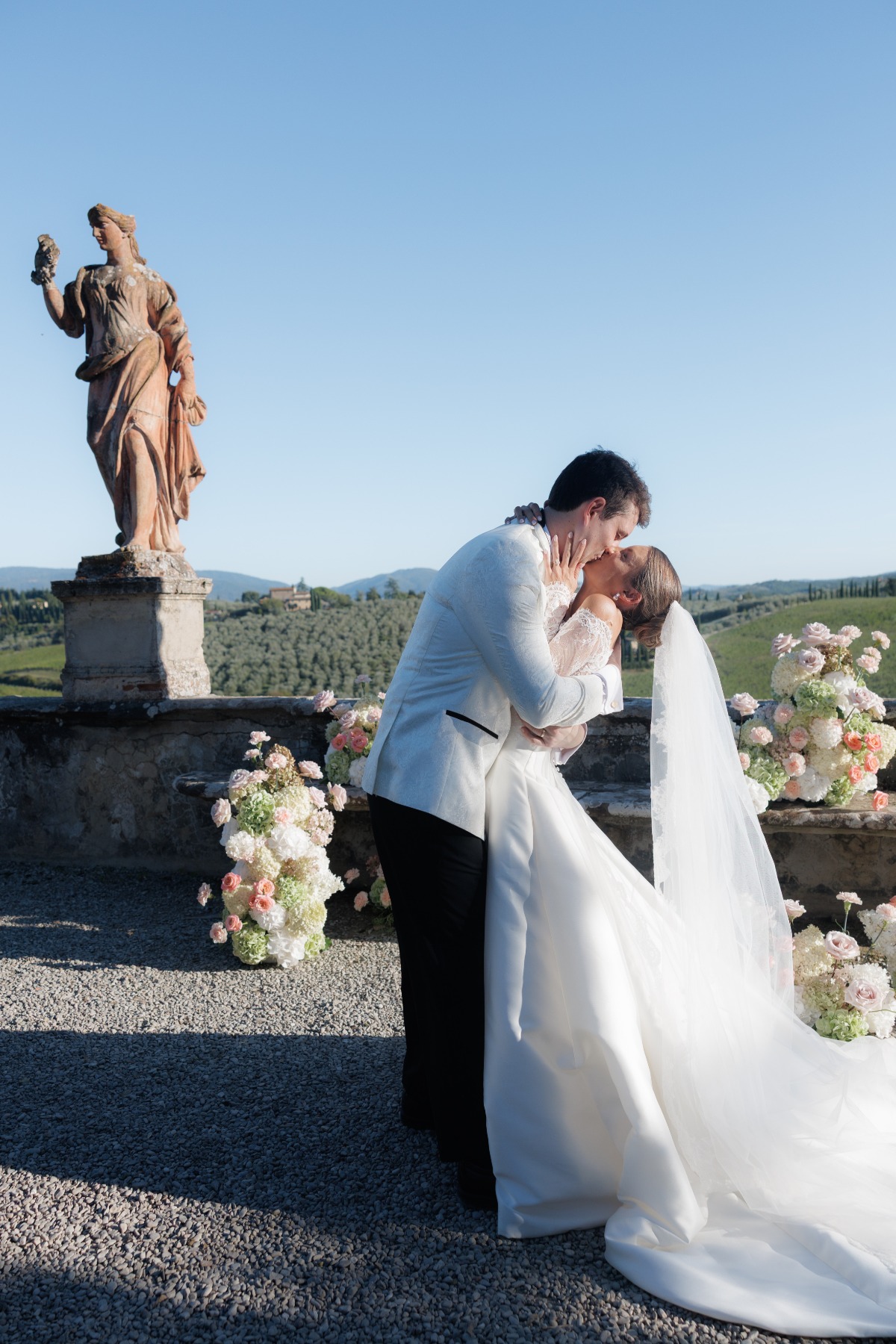 bride and groom doing their first kiss during their wedding ceremony