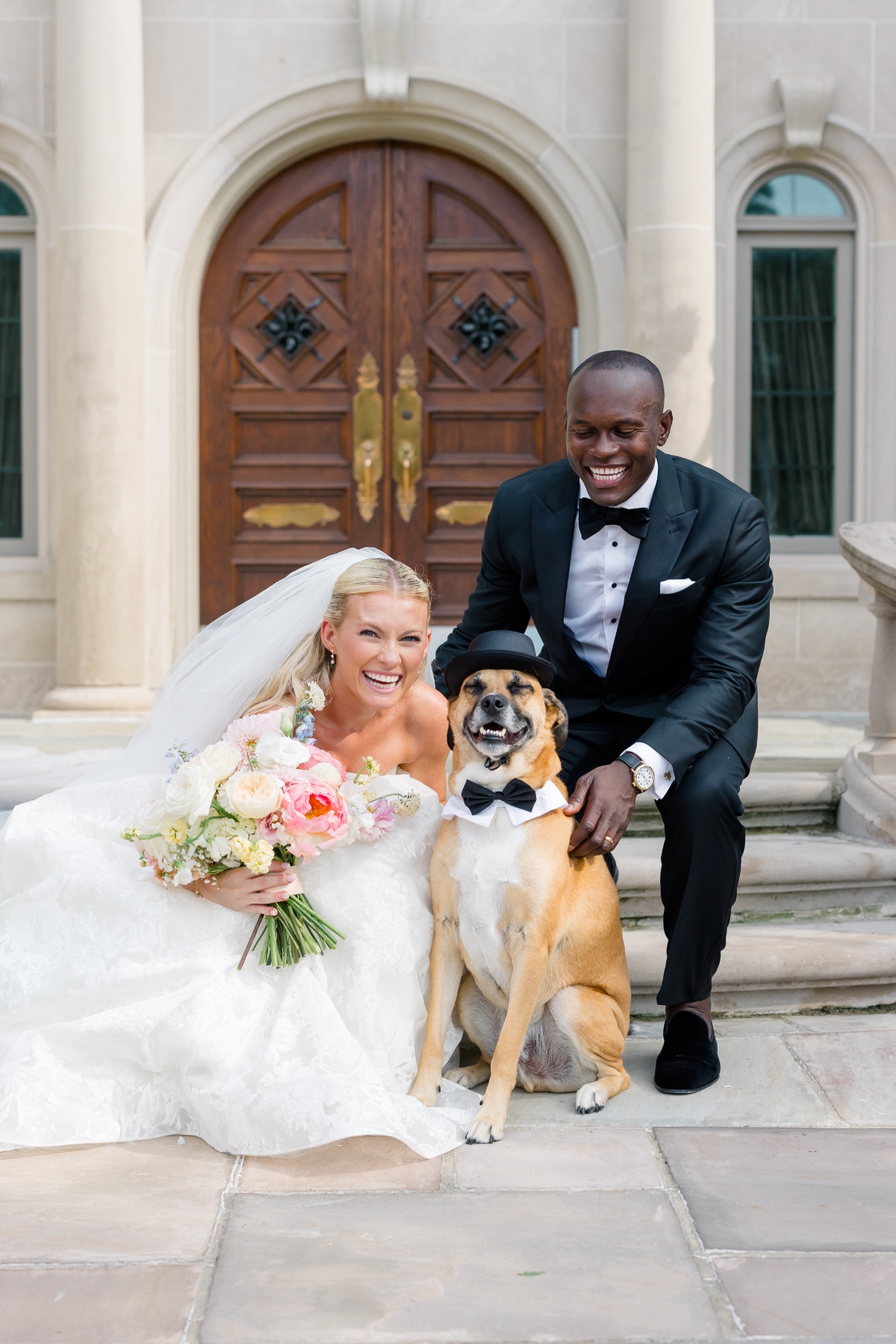bride and groom with their dog