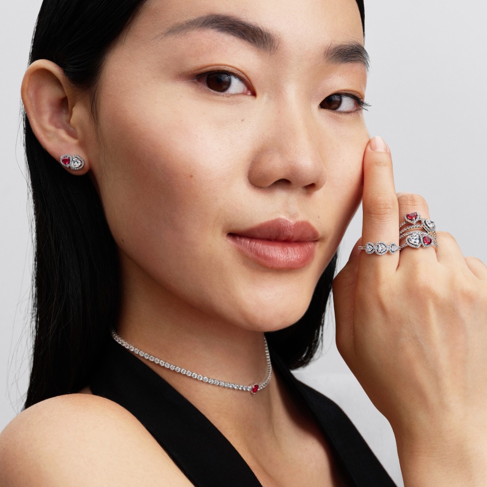 model wearing valentine's day inspired jewelry pieces