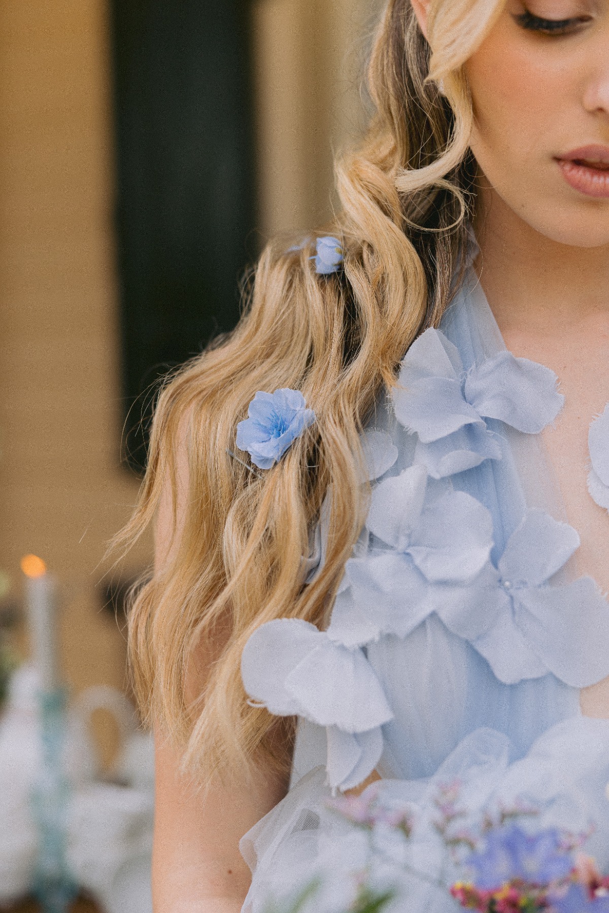 blue tulle wedding gown with petals