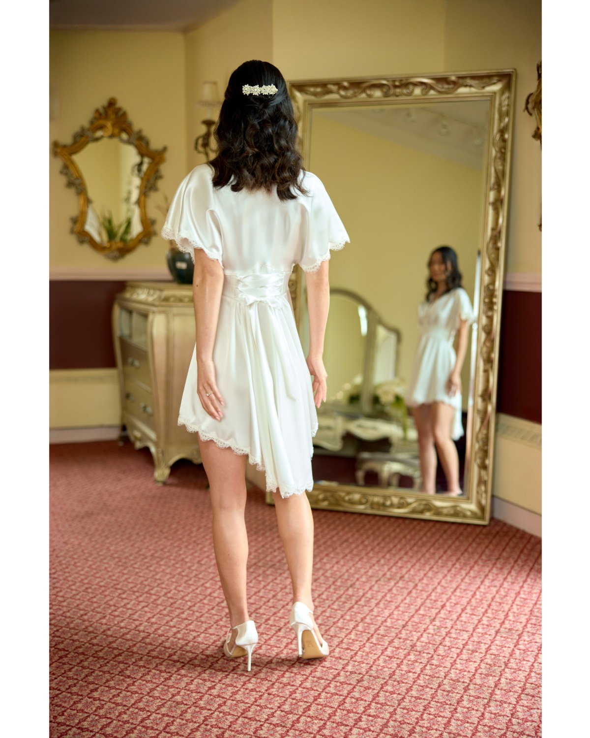 bride posing in mirror